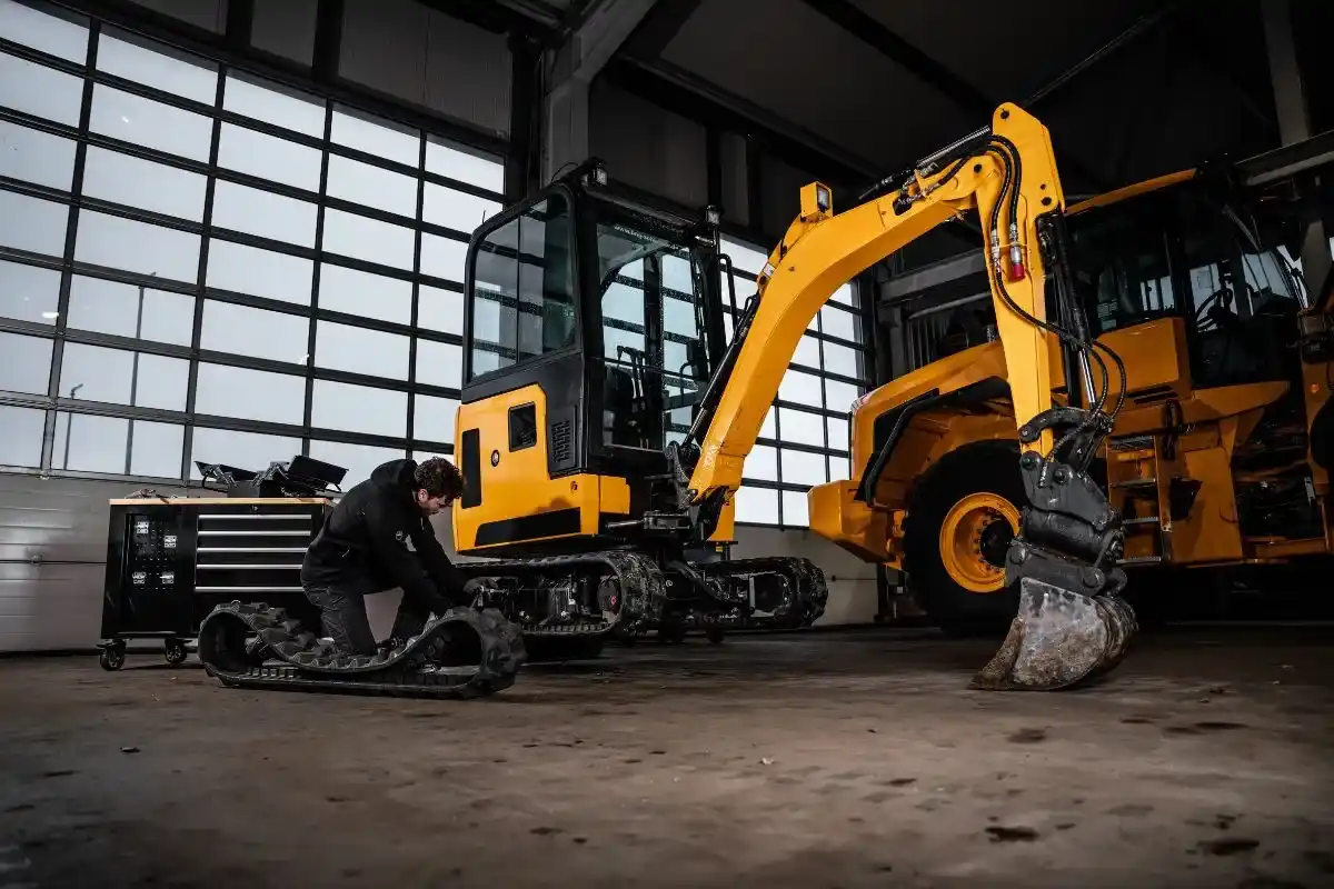 excavator and a man